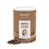 Eine Dose „Complete Shake Cappuccino“ der Anona GmbH ist abgebildet, an deren Boden Kaffeebohnen verstreut liegen. Das Etikett ist in Brauntönen gehalten und zeigt die Abbildung einer Cappuccino-Tasse.